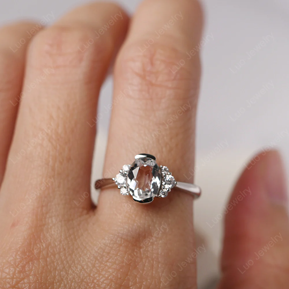 Oval Half Bezel Set White Topaz Engagement Ring - Image 5