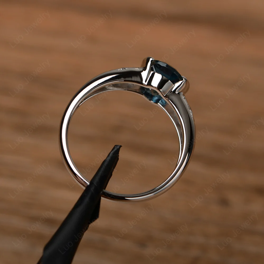 Oval London Blue Topaz Bezel Set Engagement Ring - Image 3