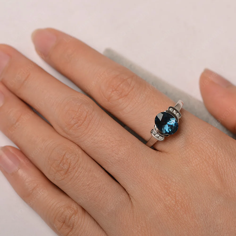 Oval London Blue Topaz Half Bezel Engagement Ring - Image 5