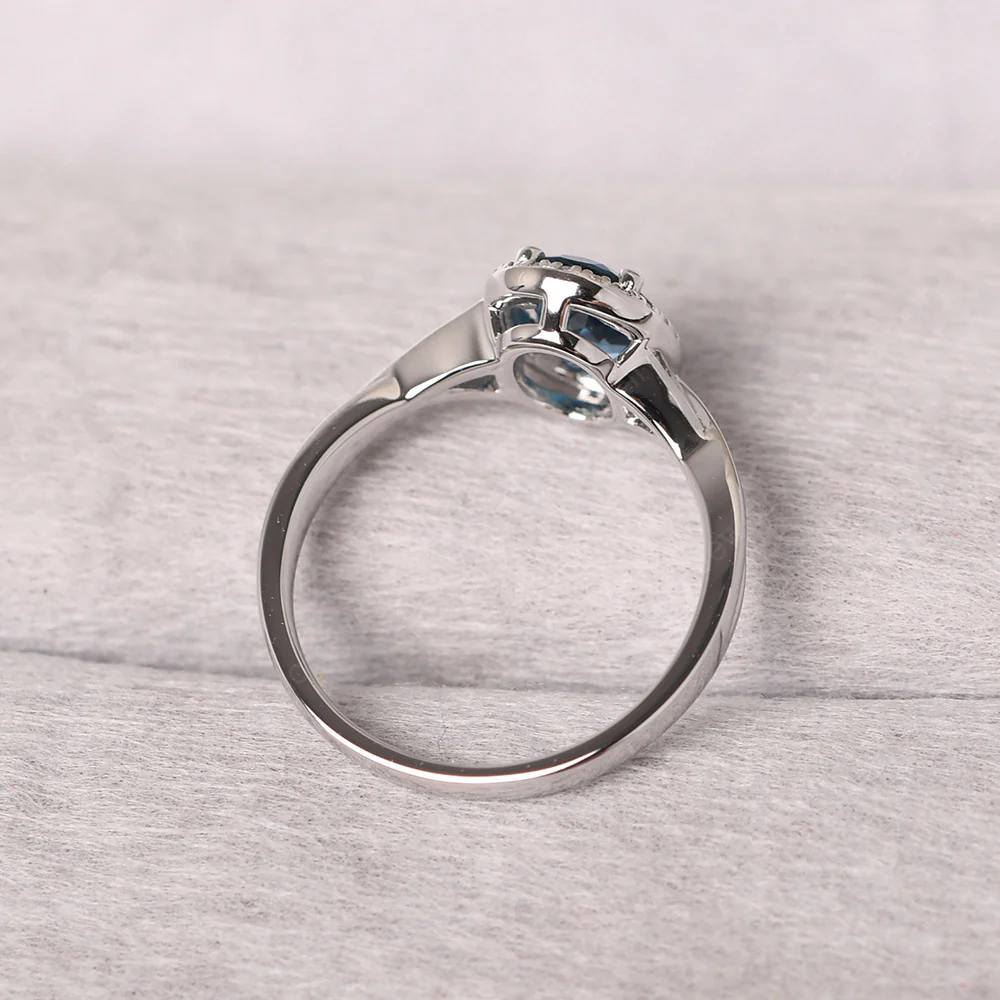London Blue Topaz Oval Halo Engagement Ring - Image 3