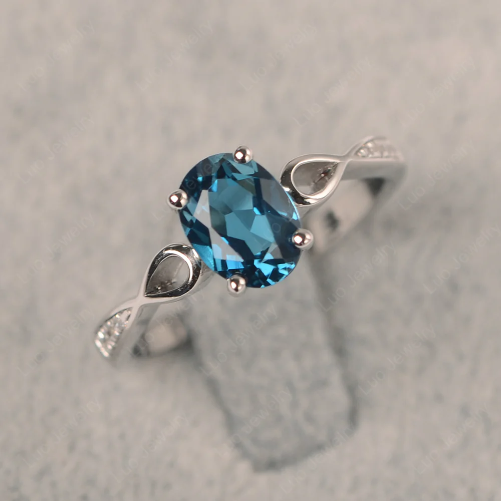 Oval London Blue Topaz Delicate Engagement Ring