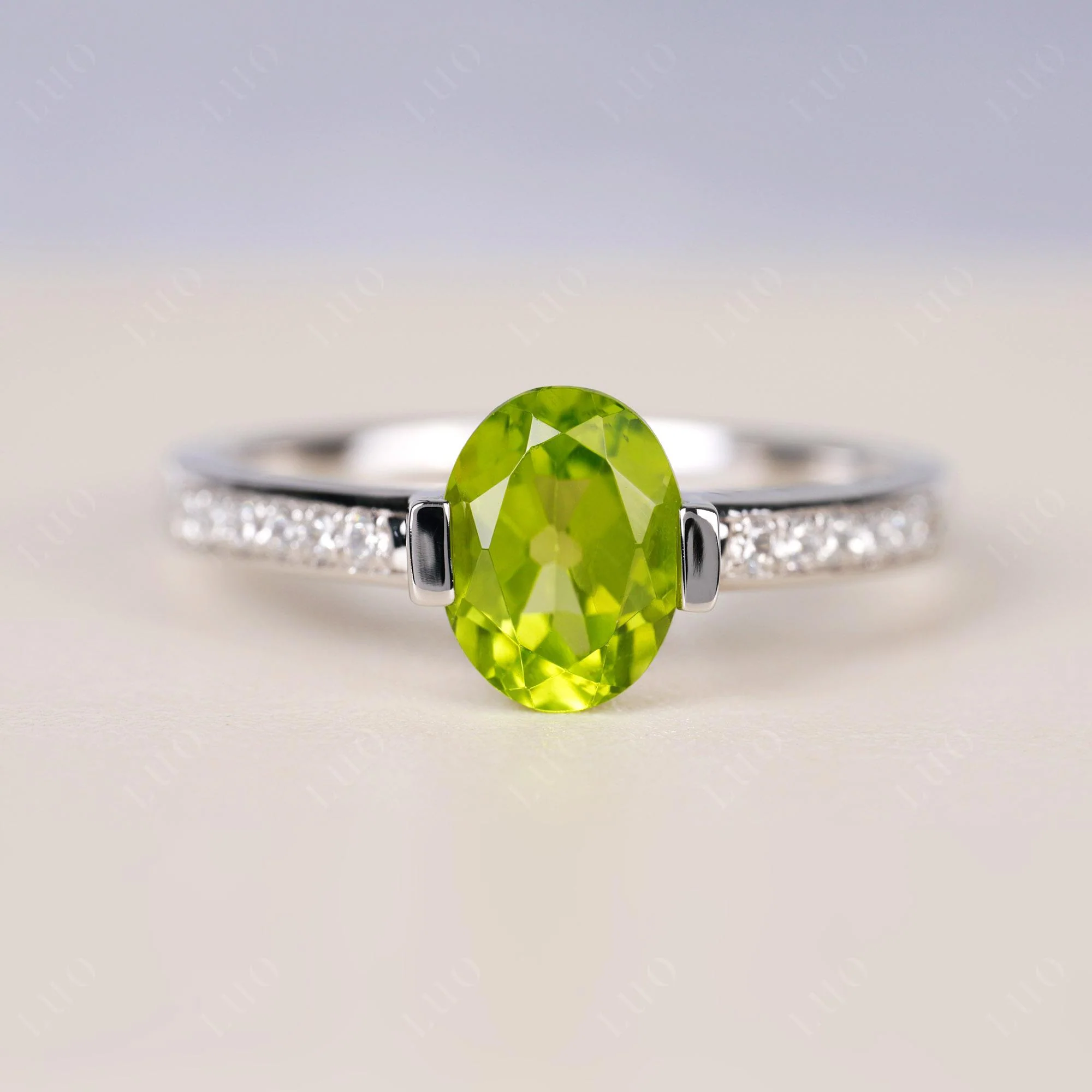 Oval Peridot Engagement Ring Half Bezel Set