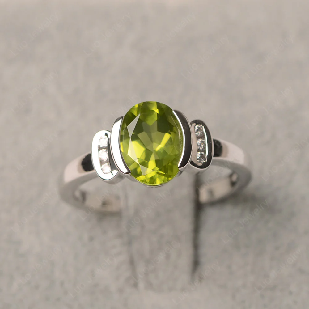 Oval Peridot Half Bezel Engagement Ring