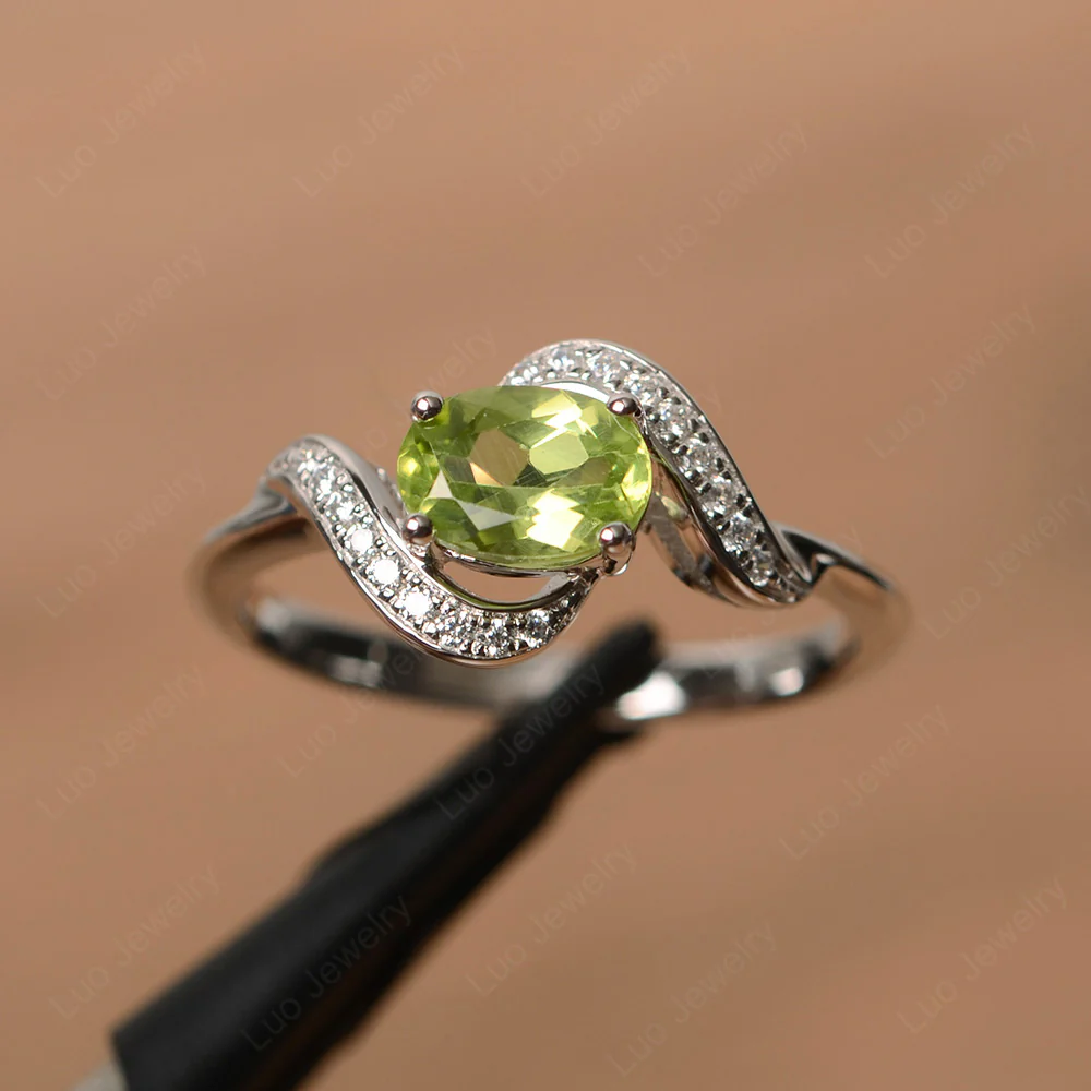 Oval Peridot East West Engagement Ring