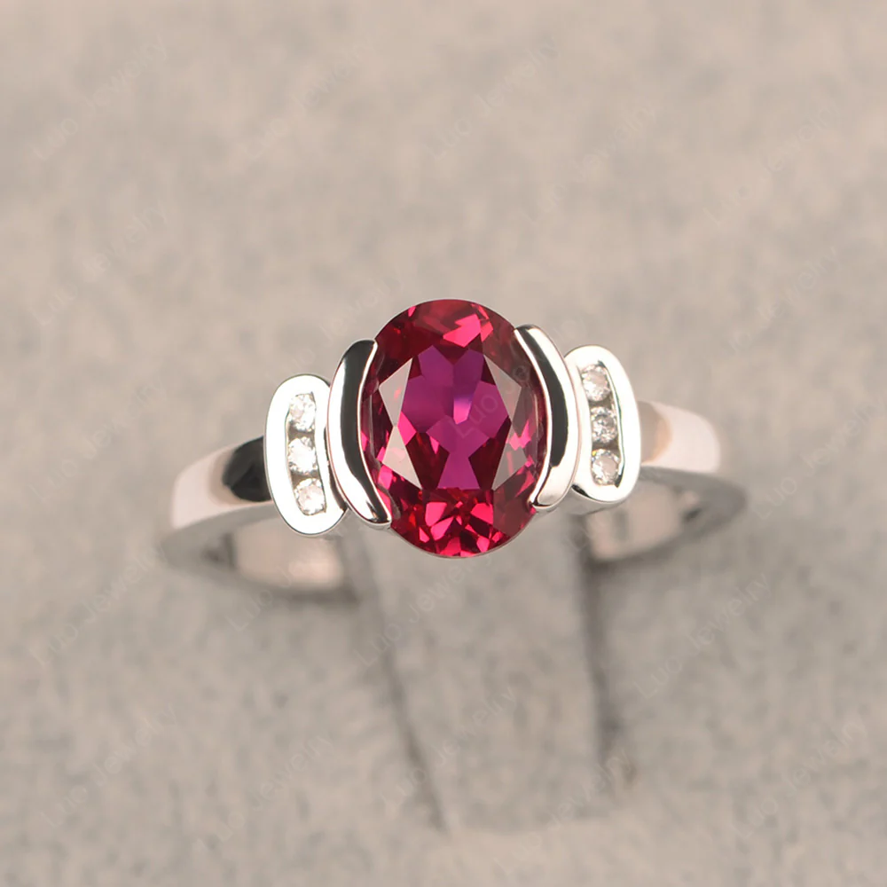 Oval Ruby Half Bezel Engagement Ring