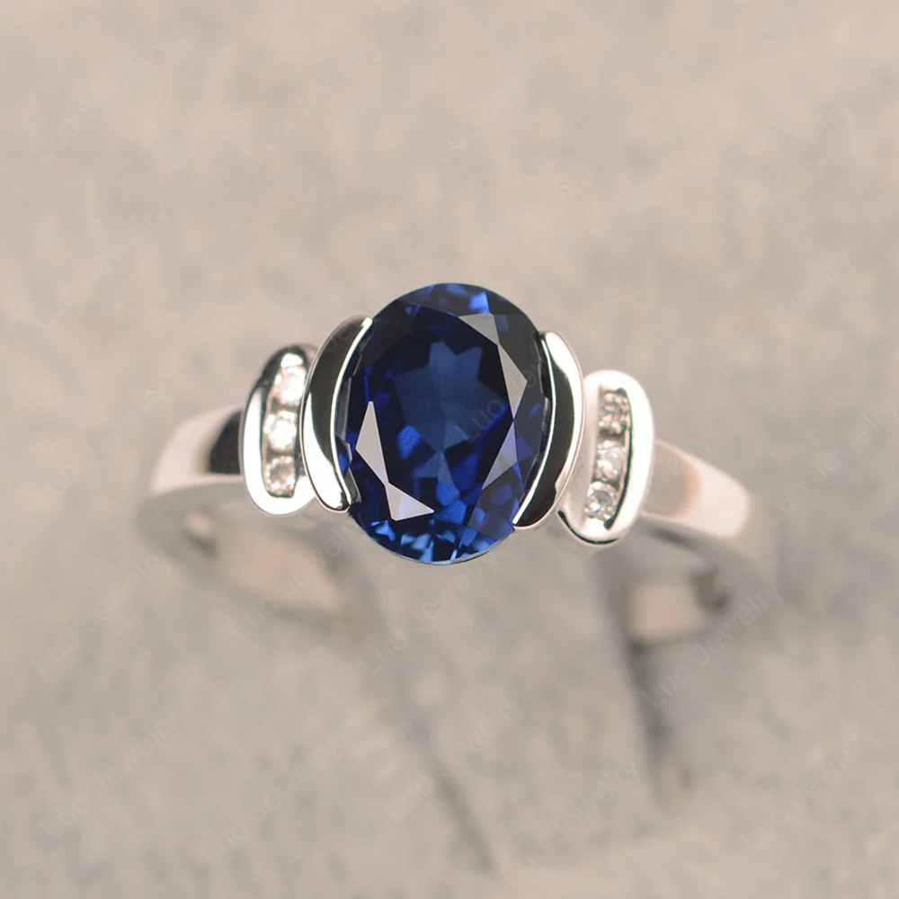 Oval Sapphire Half Bezel Engagement Ring - Image 2