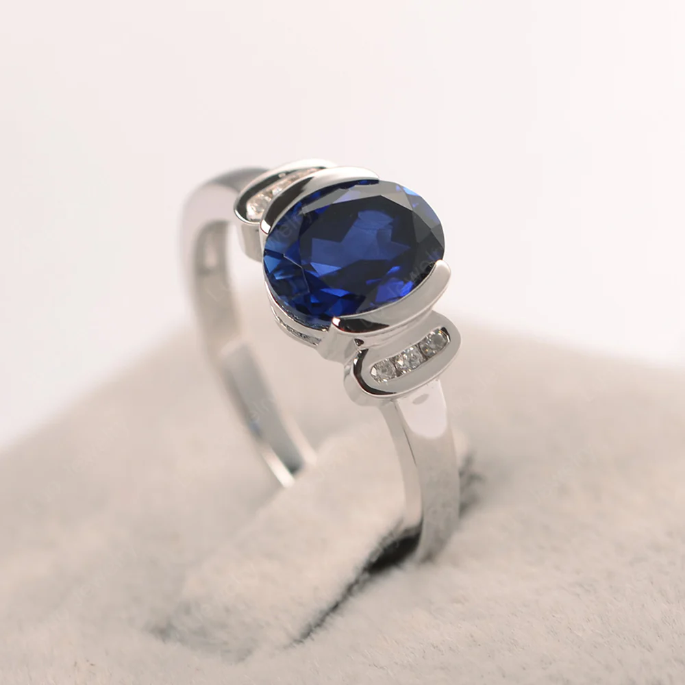 Oval Sapphire Half Bezel Engagement Ring - Image 3