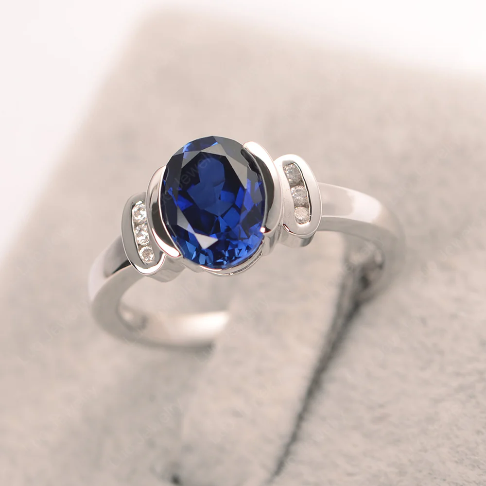 Oval Sapphire Half Bezel Engagement Ring - Image 4