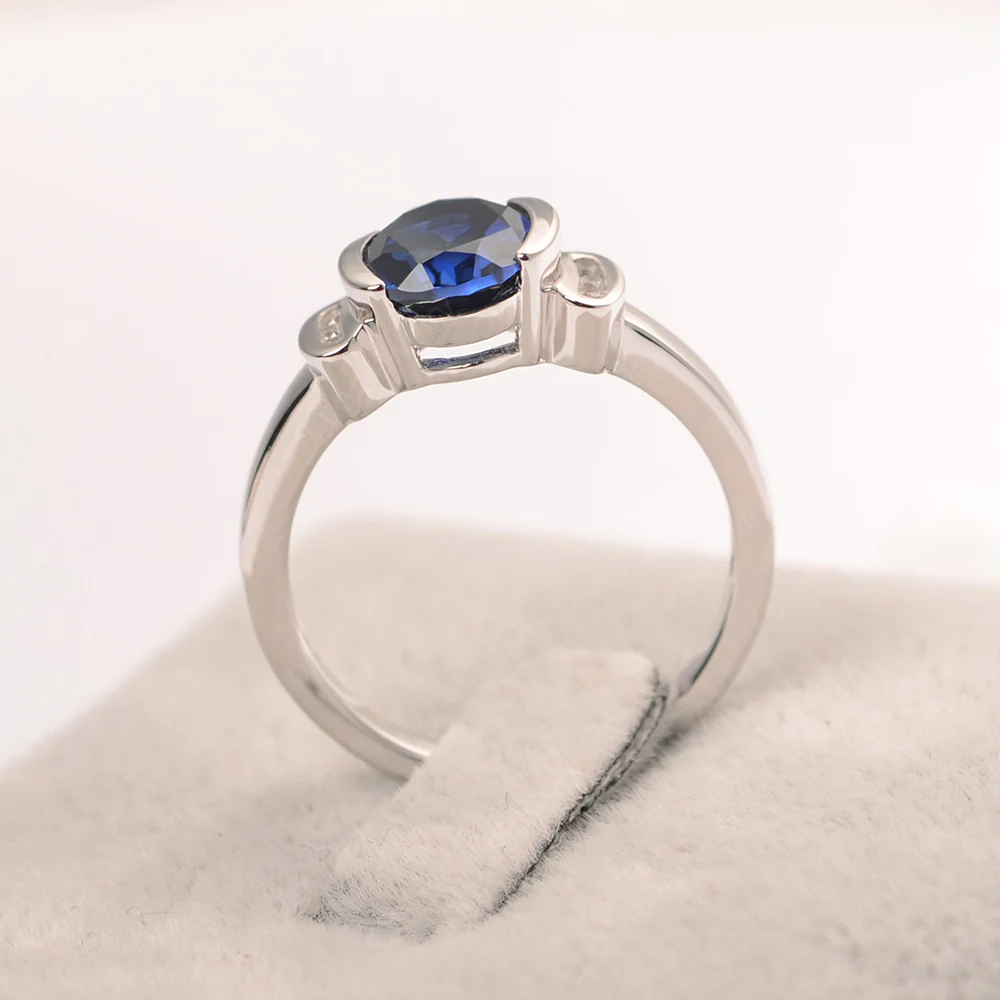 Oval Sapphire Half Bezel Engagement Ring - Image 5