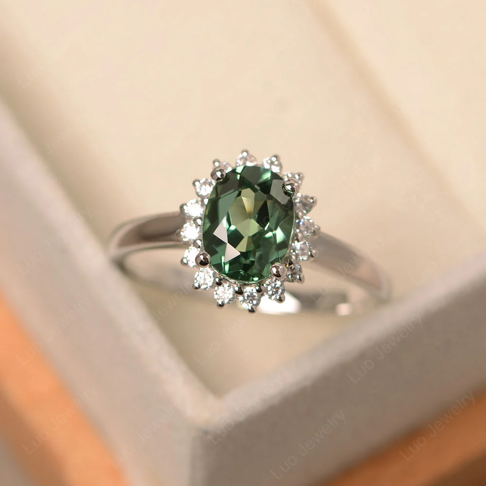 Green Sapphire Oval Sunburst Engagement Ring
