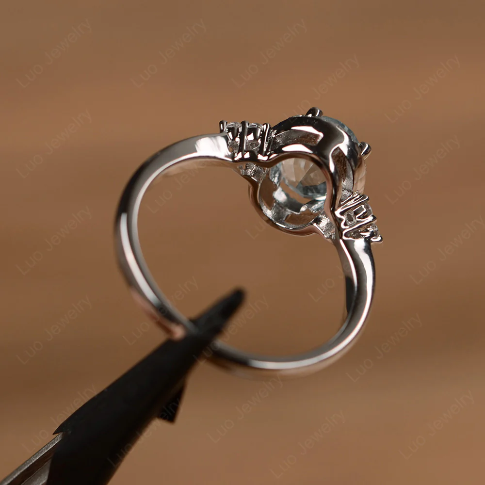 Oval Shaped Aquamarine Halo Engagement Ring - Image 3