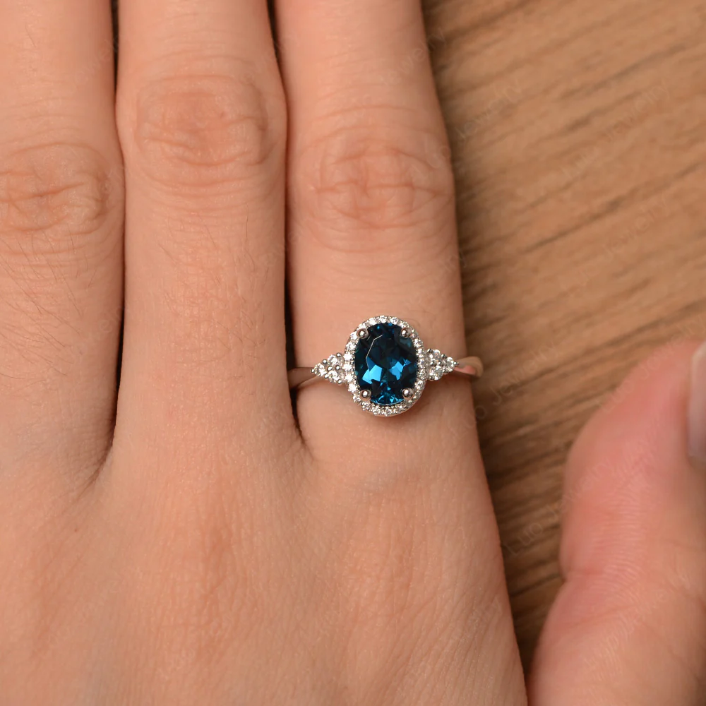 Oval Shaped London Blue Topaz Halo Engagement Ring - Image 4