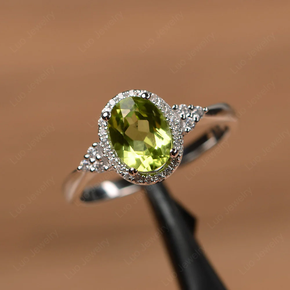 Oval Shaped Peridot Halo Engagement Ring - Image 2