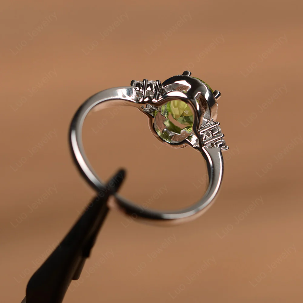 Oval Shaped Peridot Halo Engagement Ring - Image 3