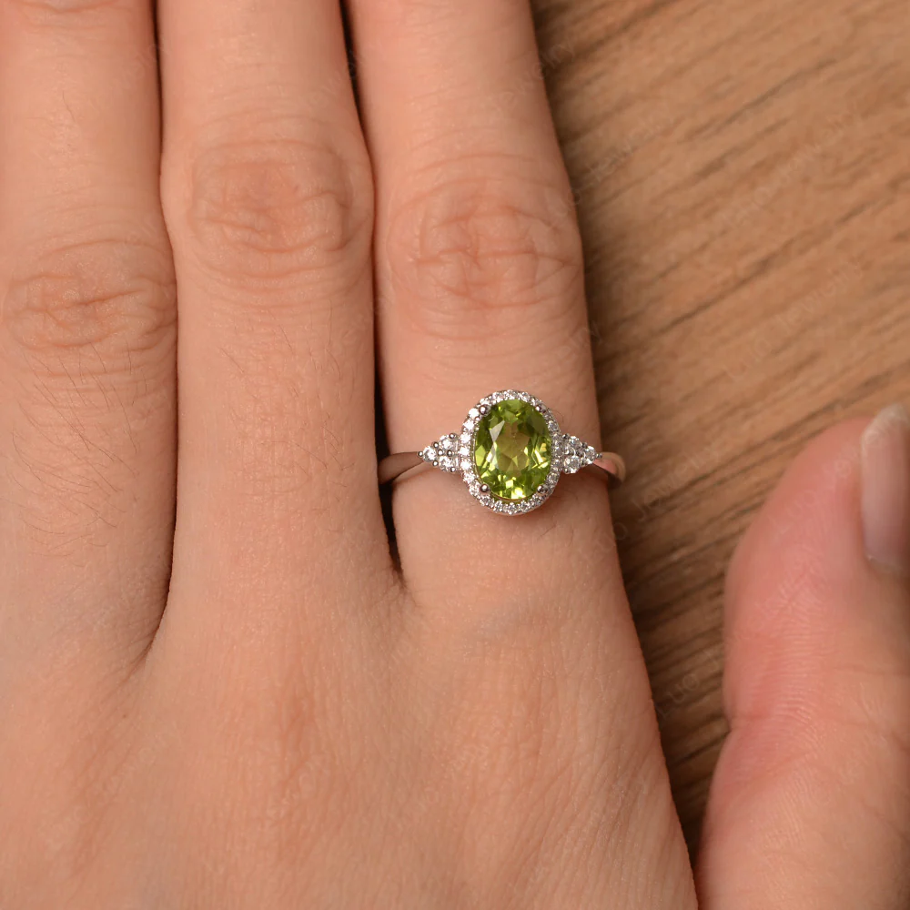 Oval Shaped Peridot Halo Engagement Ring - Image 4
