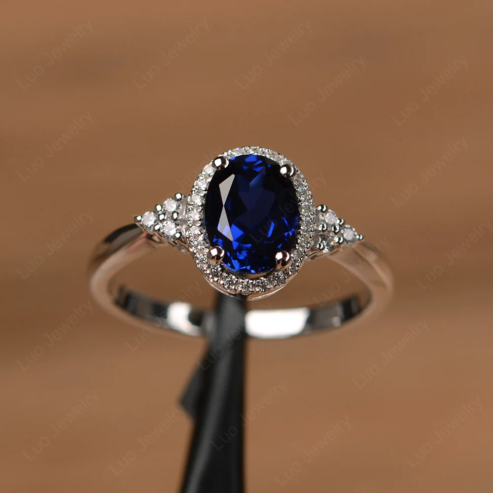Oval Shaped Sapphire Halo Engagement Ring