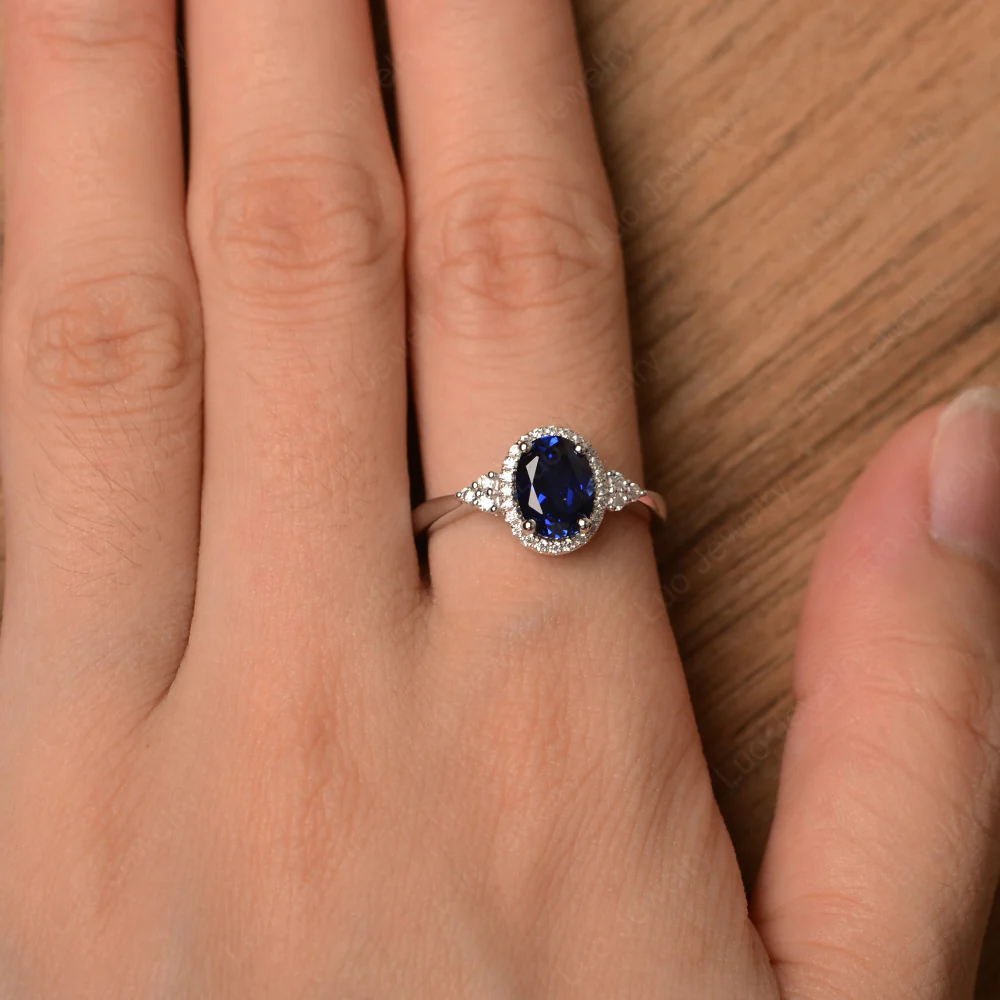 Oval Shaped Sapphire Halo Engagement Ring - Image 4