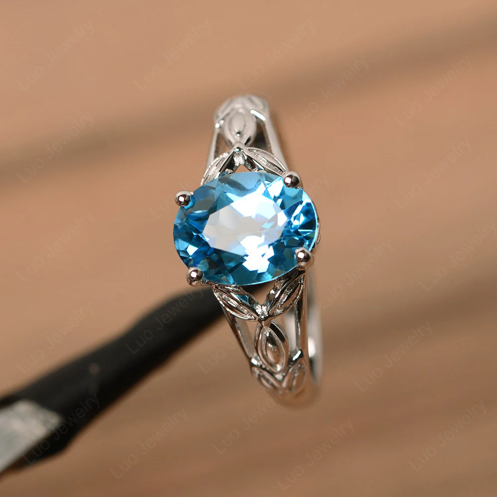 Swiss Blue Topaz Leaf Solitaire Engagement Ring