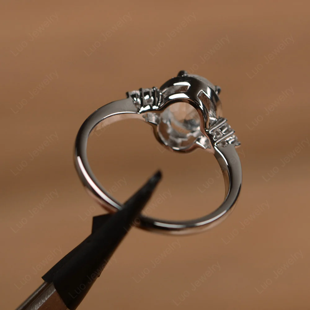 Oval Shaped White Topaz Halo Engagement Ring - Image 3