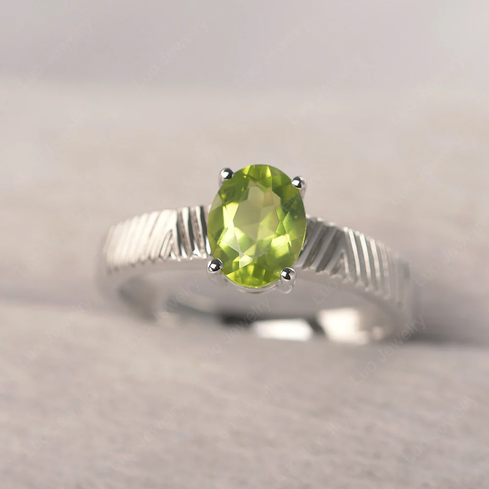 Oval Peridot Chevron Ring