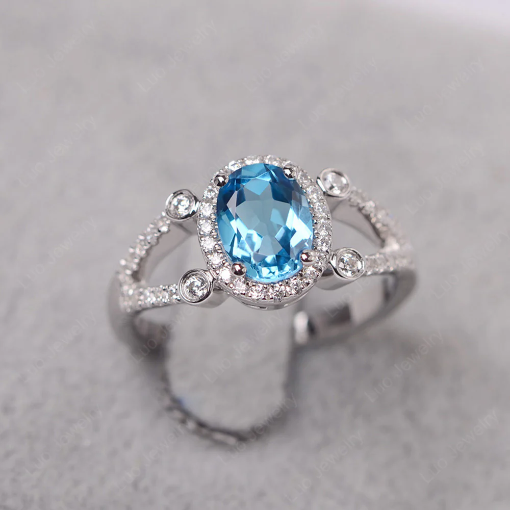 Oval Swiss Blue Topaz Split Shank Engagement Ring