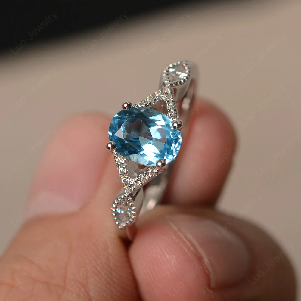 Oval Swiss Blue Topaz Split Shank Ring