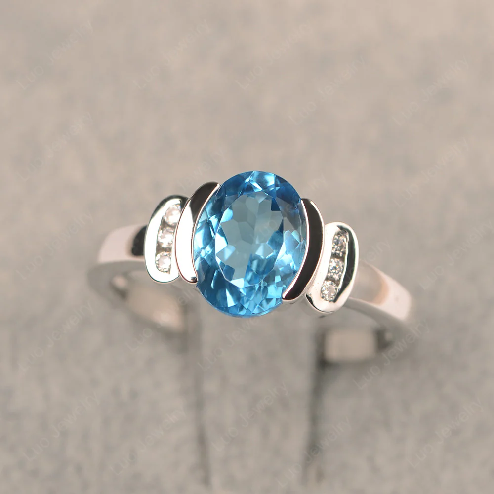 Oval Swiss Blue Topaz Half Bezel Engagement Ring - Image 2