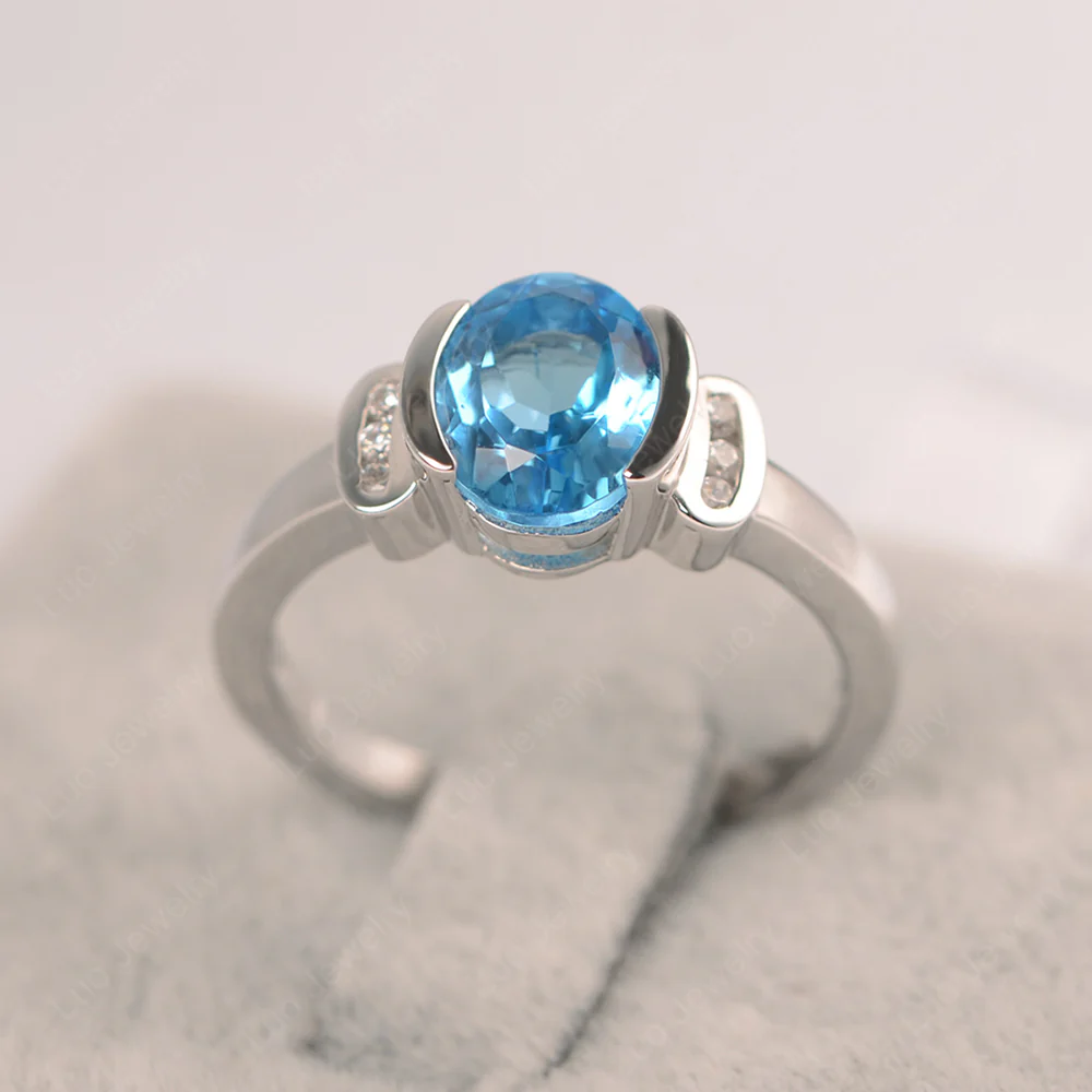 Oval Swiss Blue Topaz Half Bezel Engagement Ring - Image 3