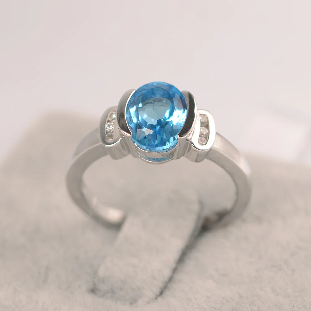 Oval Swiss Blue Topaz Half Bezel Engagement Ring - Image 4