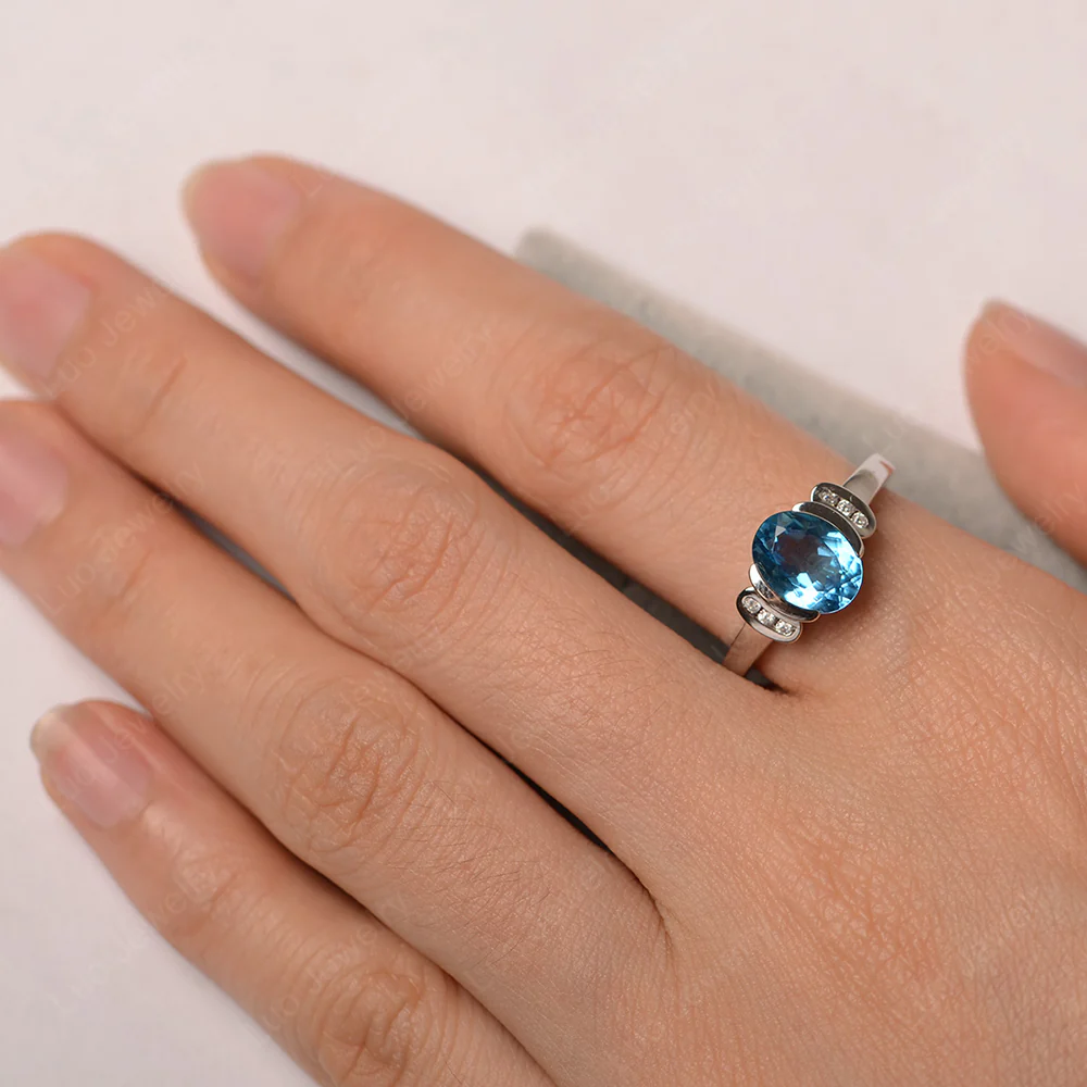 Oval Swiss Blue Topaz Half Bezel Engagement Ring - Image 6