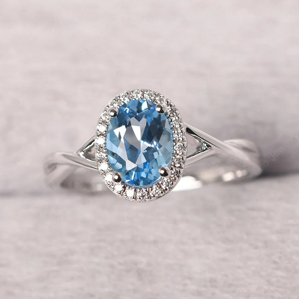 Swiss Blue Topaz Oval Halo Ring