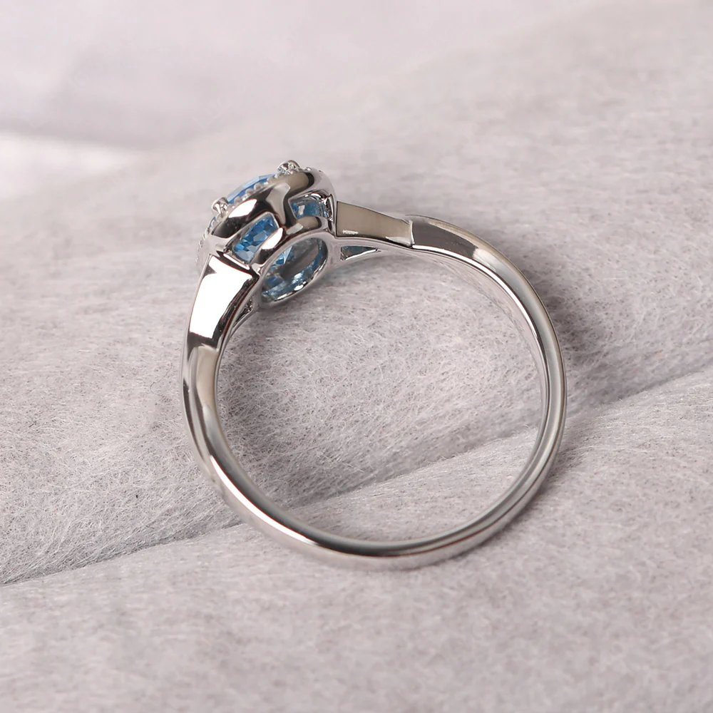 Swiss Blue Topaz Oval Halo Ring - Image 3