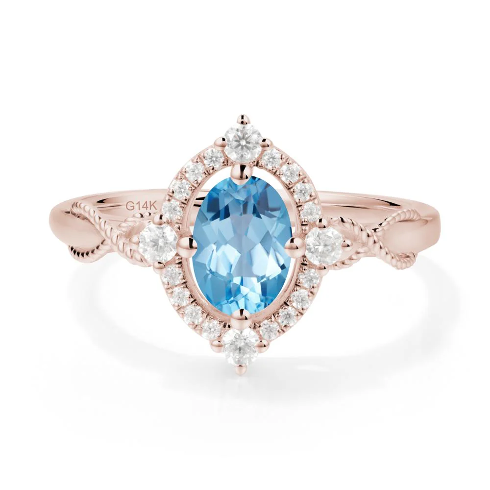 Oval Swiss Blue Topaz Halo Twist Ring