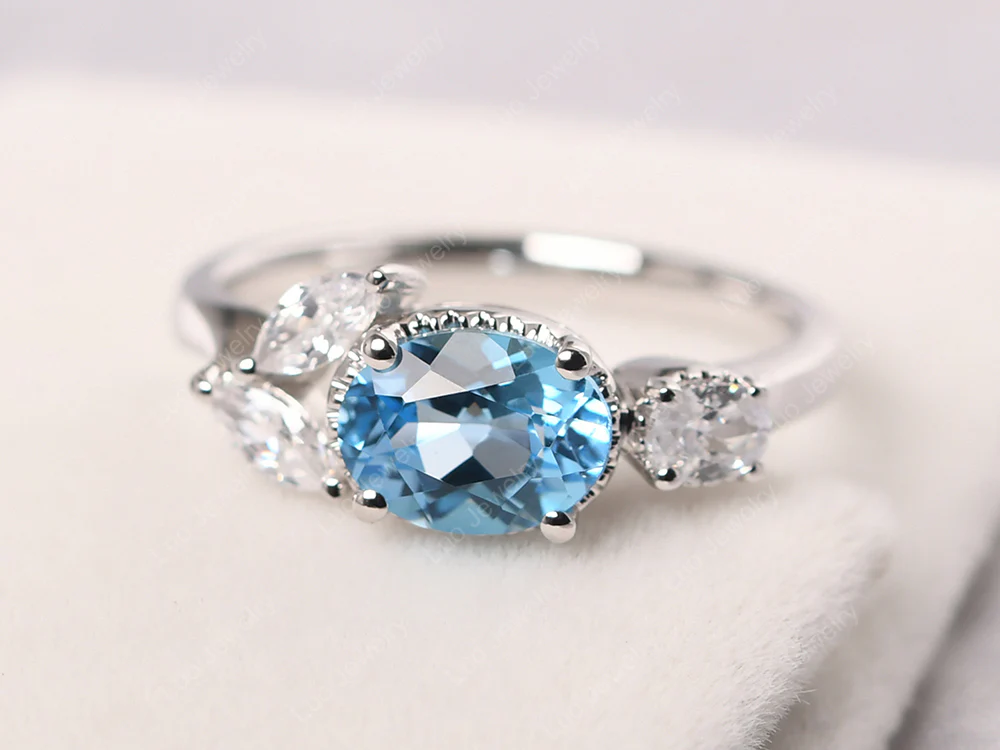 Oval Swiss Blue Topaz Cluster Ring