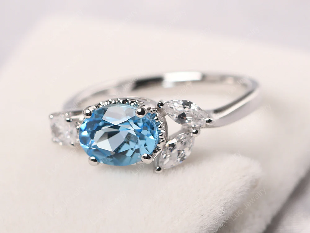 Oval Swiss Blue Topaz Cluster Ring - Image 2