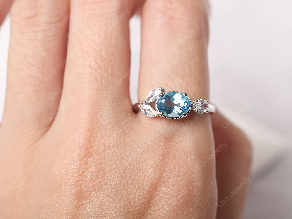Oval Swiss Blue Topaz Cluster Ring - Image 5