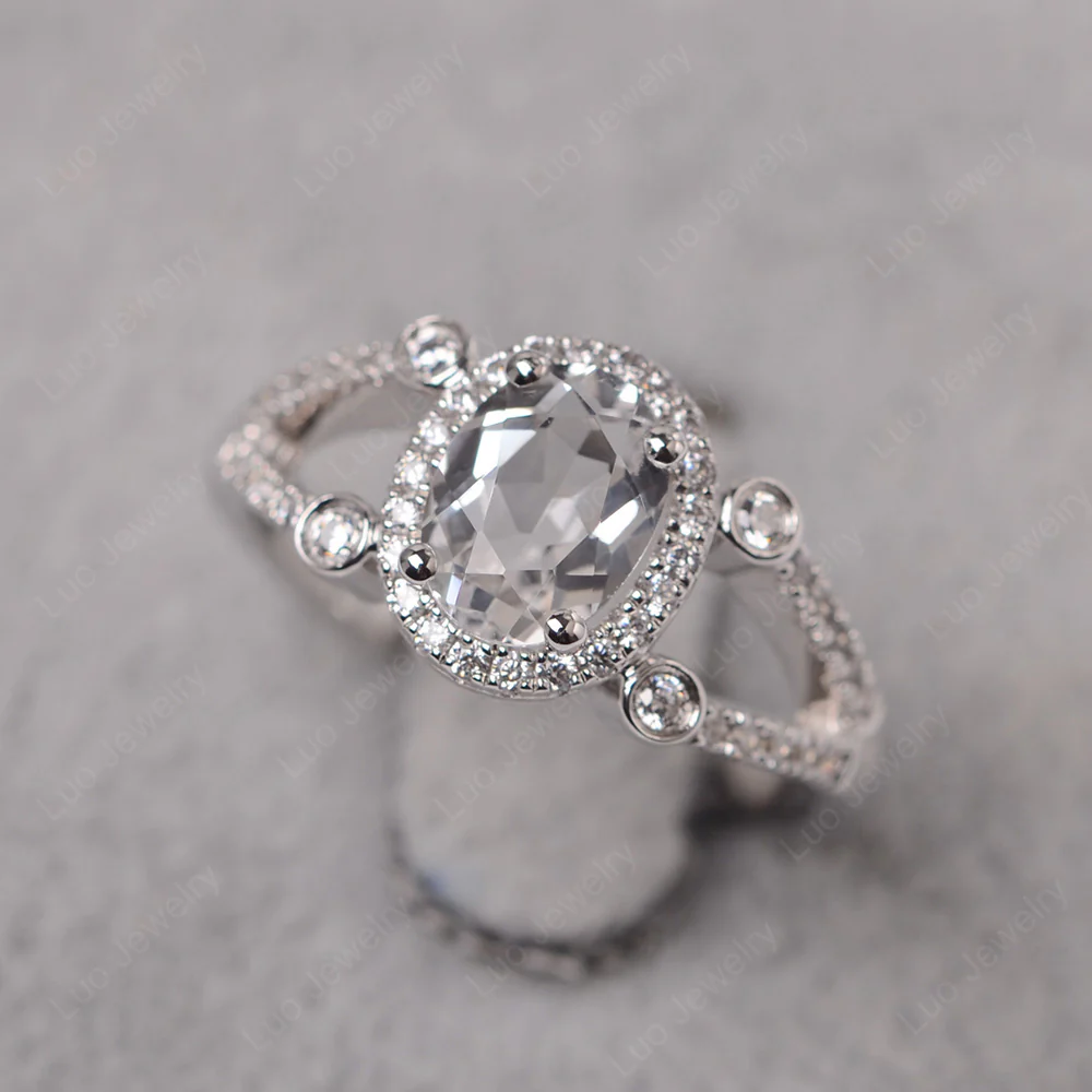 Oval White Topaz Split Shank Engagement Ring