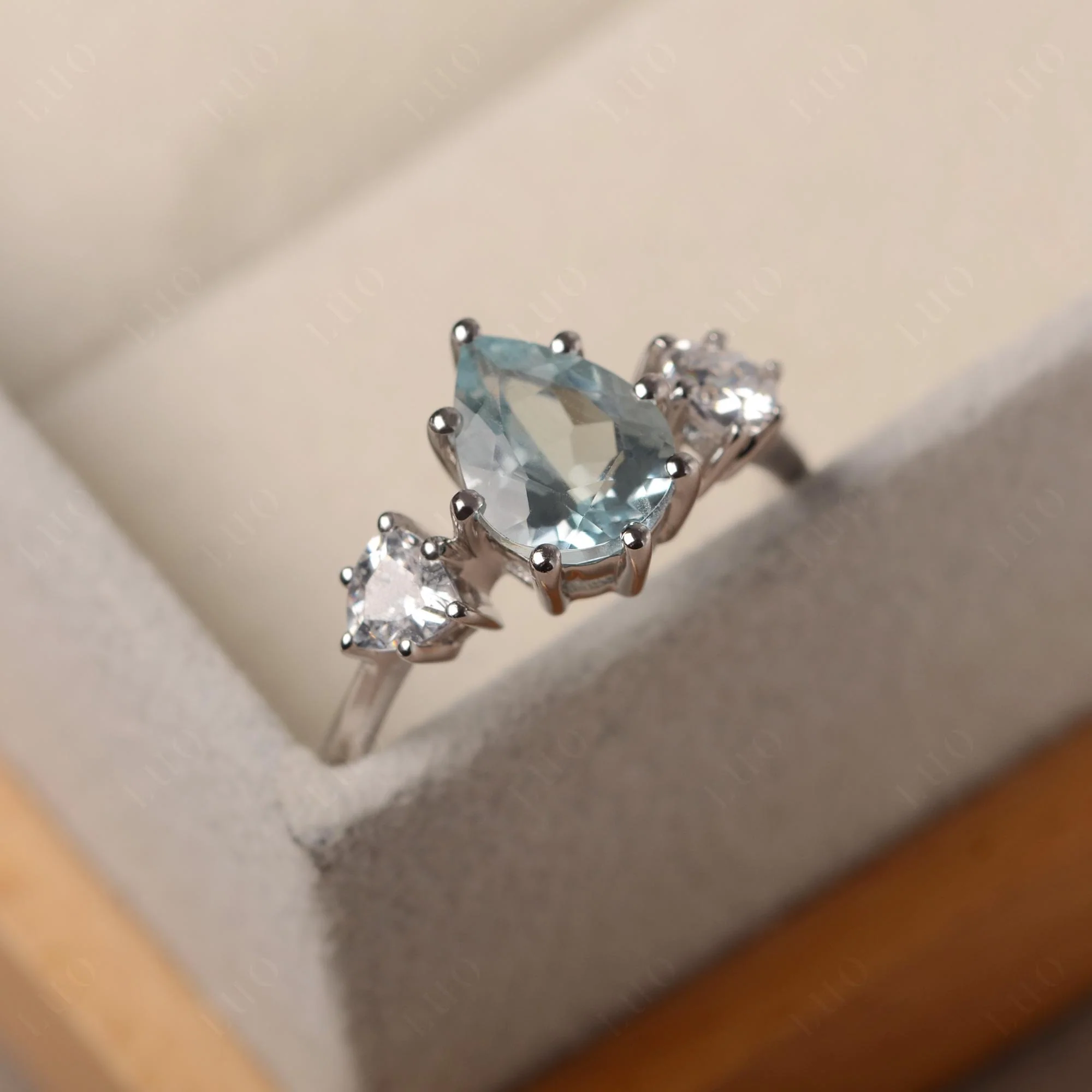 Pear Aquamarine Ring with Trillion Side Stone - Image 30