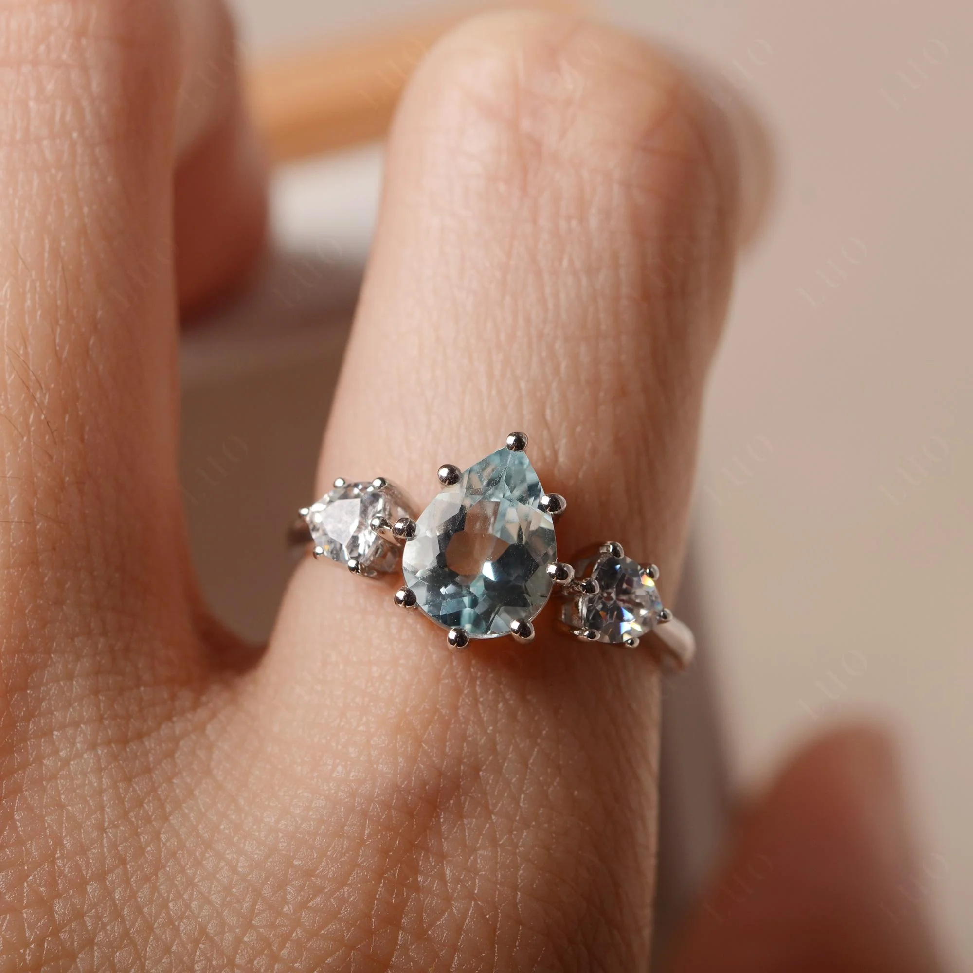 Pear Aquamarine Ring with Trillion Side Stone - Image 33