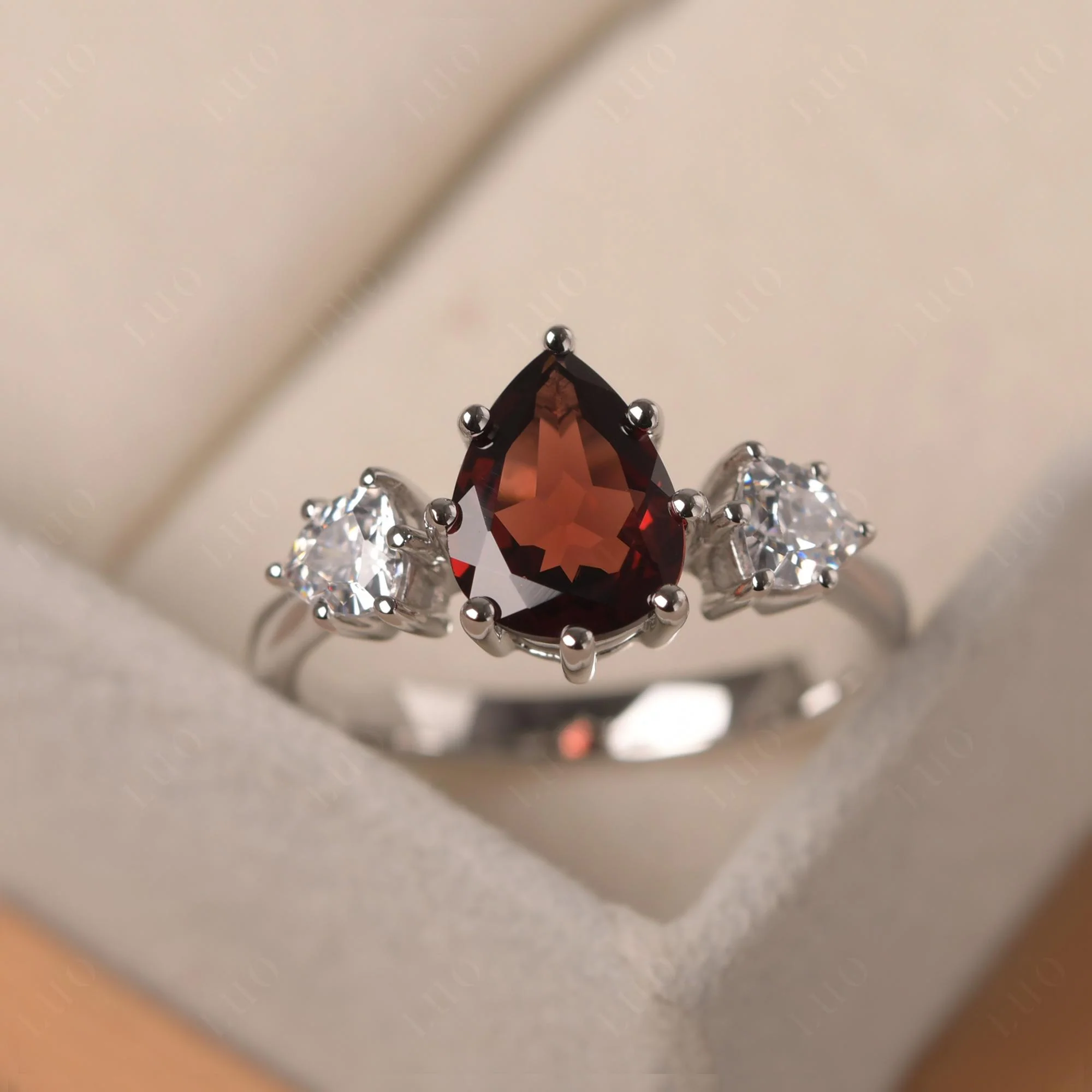 Pear Garnet Ring with Trillion Side Stone - Image 29