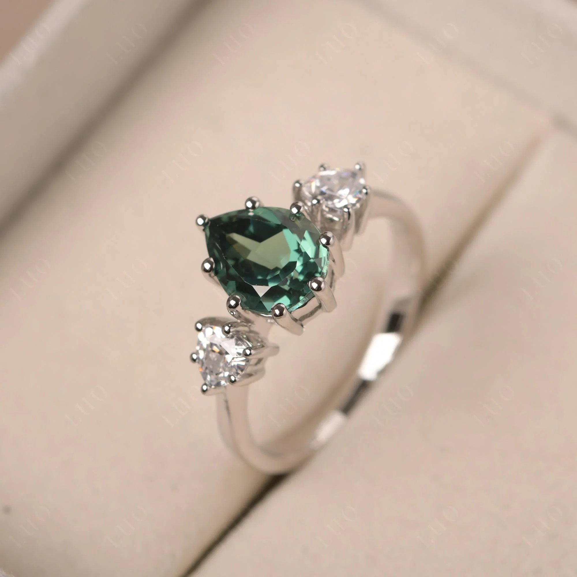 Pear Green Sapphire Ring with Trillion Side Stone - Image 30
