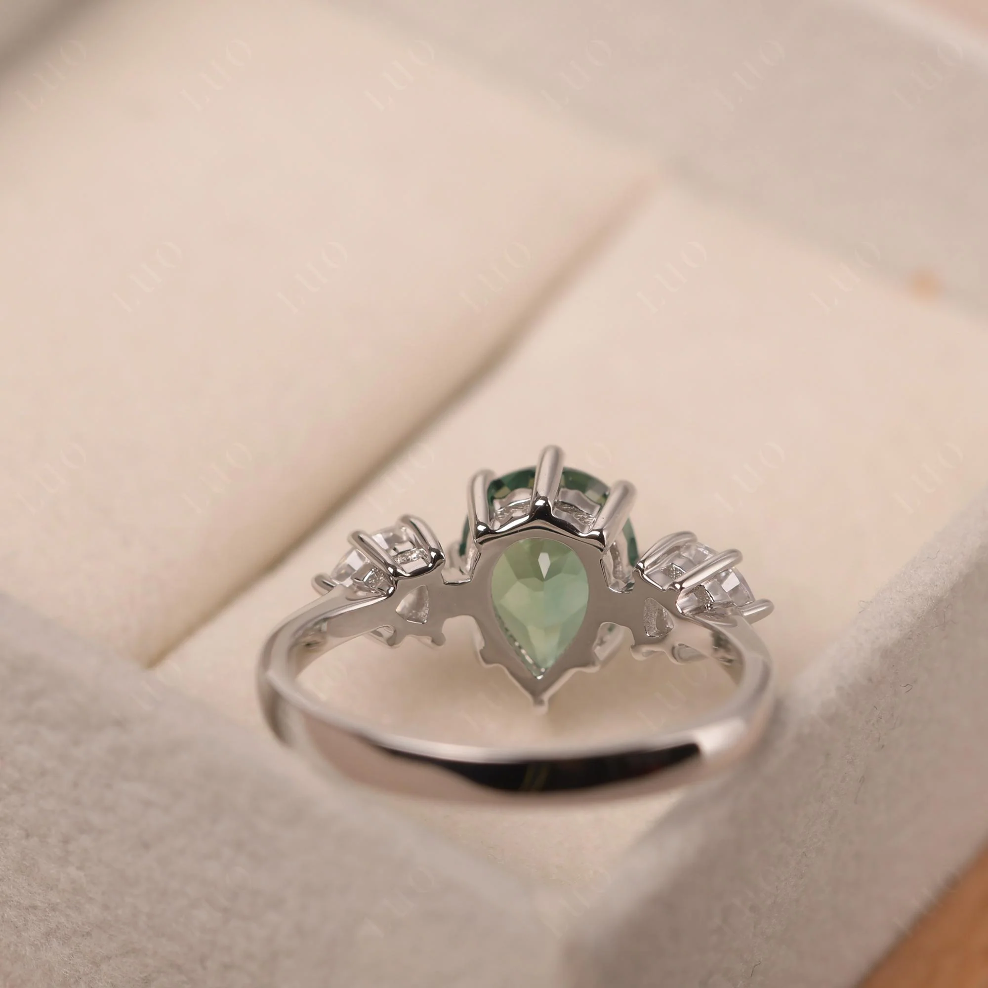 Pear Green Sapphire Ring with Trillion Side Stone - Image 32