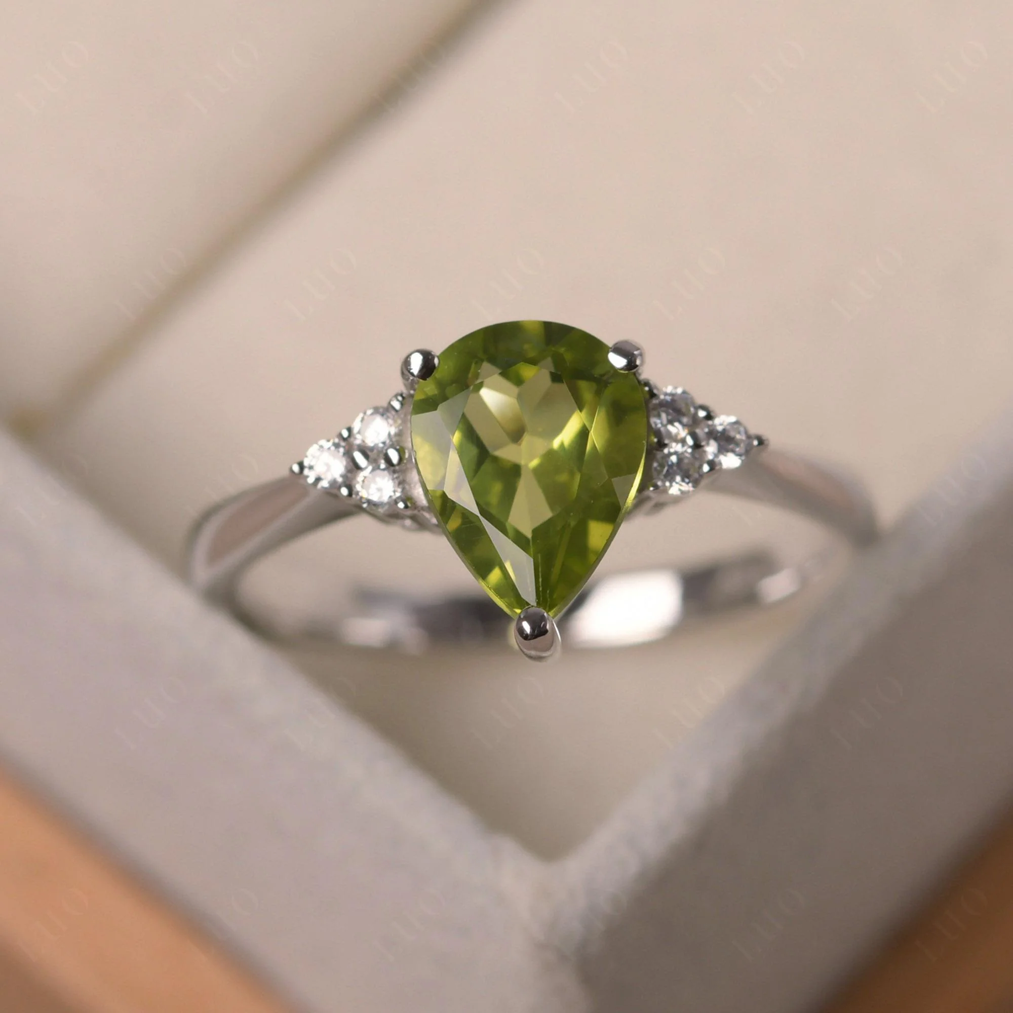 Pear Shaped Peridot Promise Ring