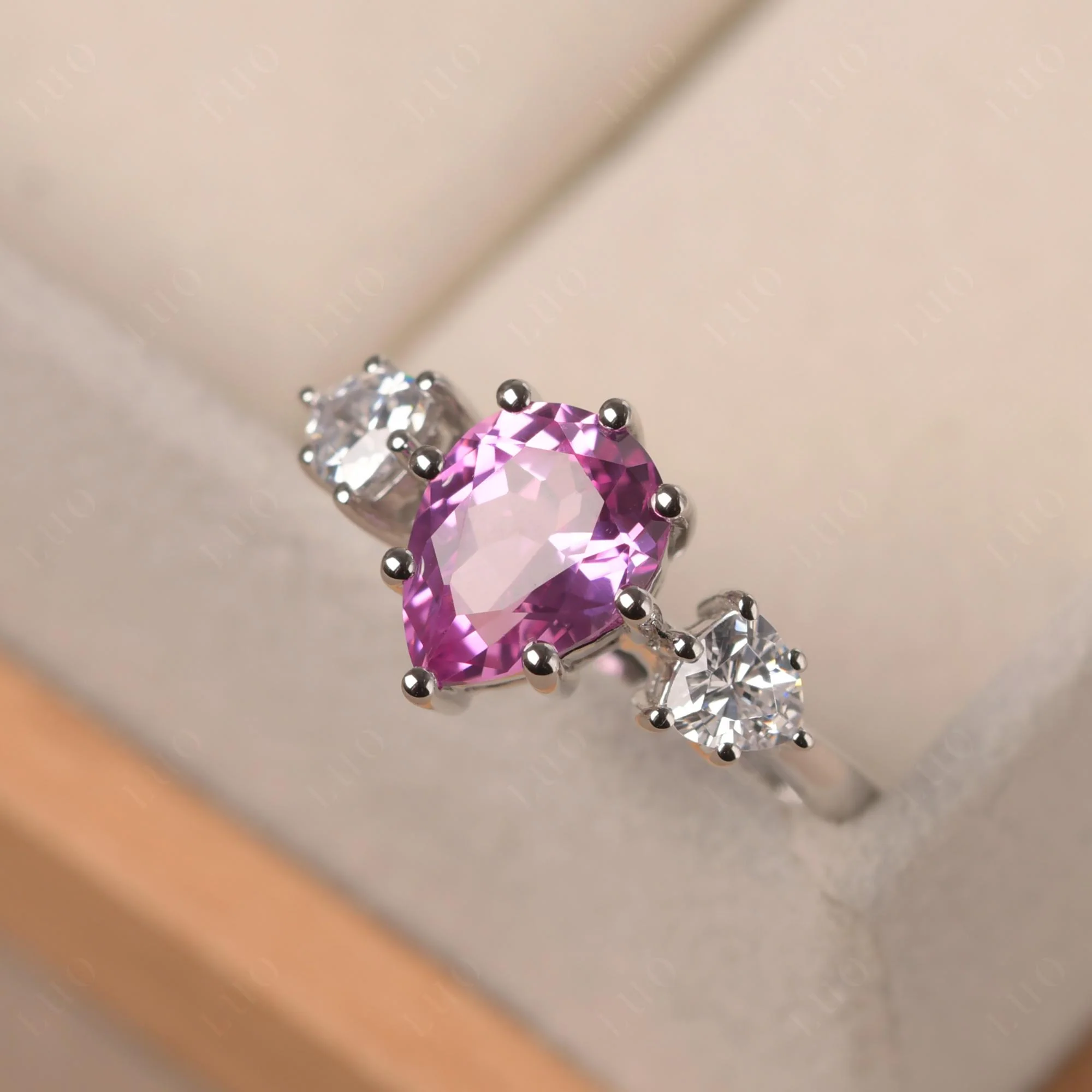 Pear Pink Sapphire Ring with Trillion Side Stone - Image 30