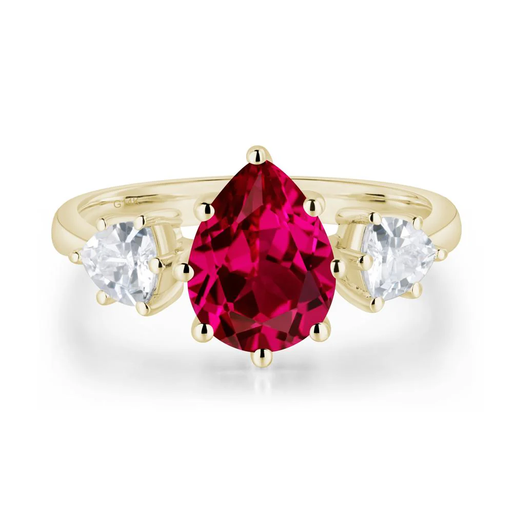 Pear Ruby Ring with Trillion Side Stone - Image 4