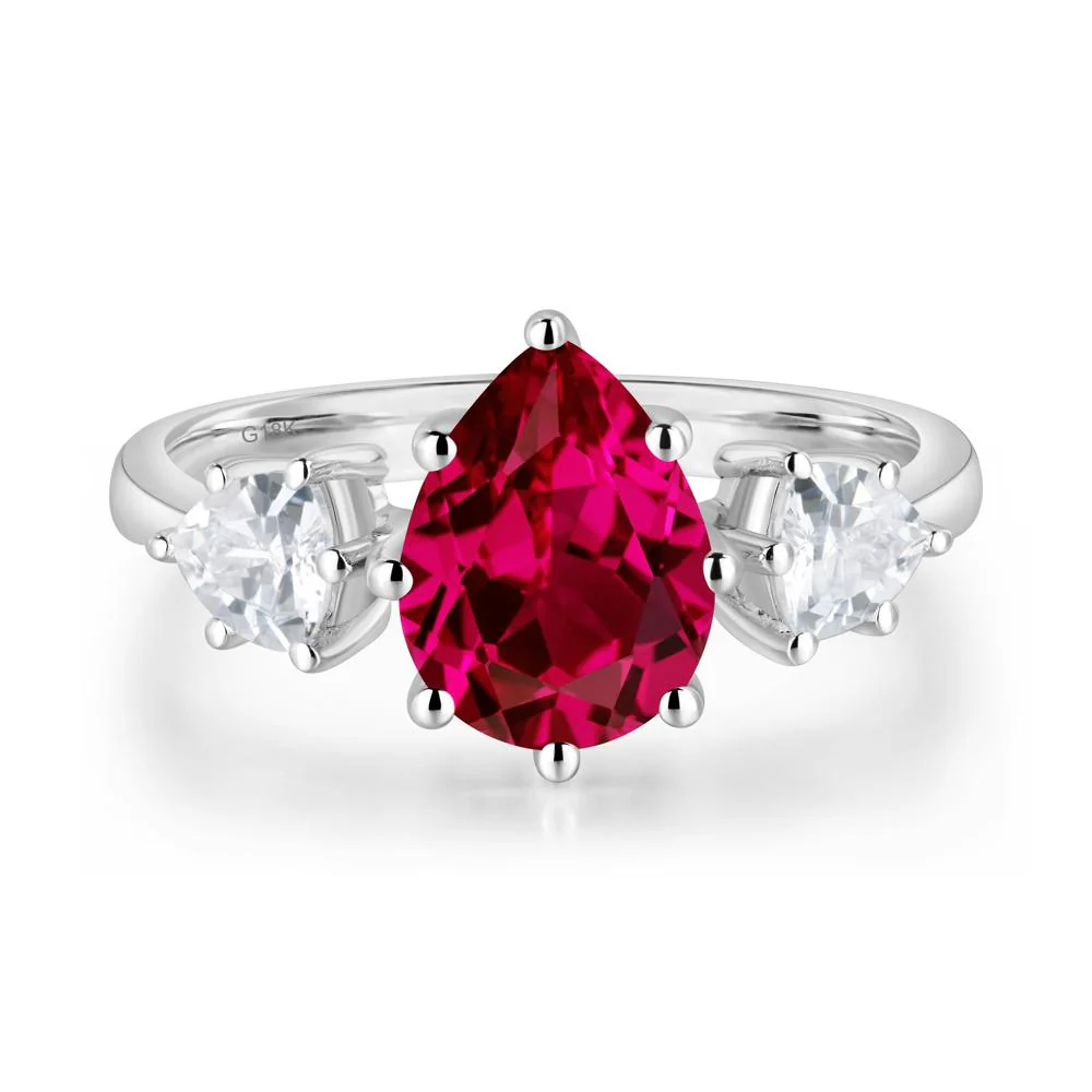 Pear Ruby Ring with Trillion Side Stone - Image 6