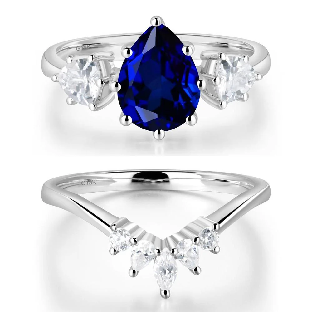 Pear Sapphire Ring with Trillion Side Stone - Image 19