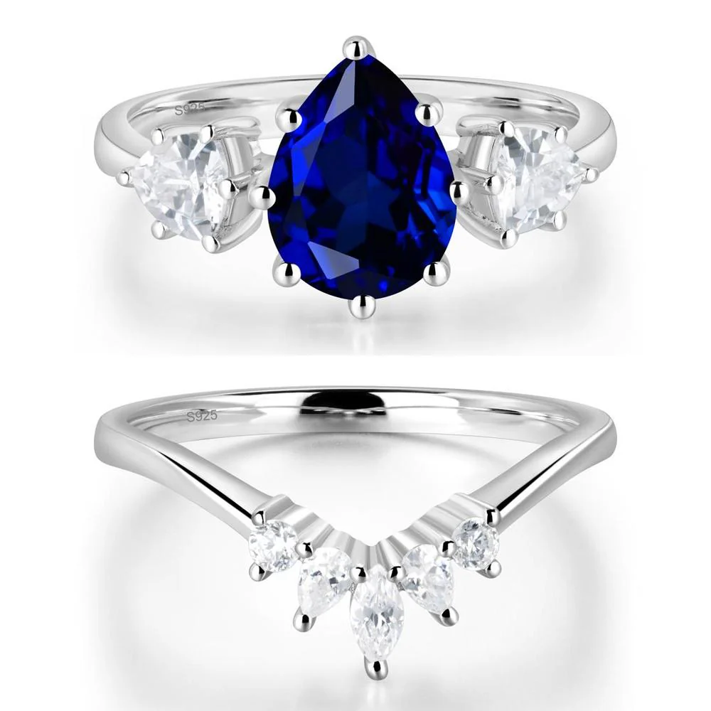 Pear Sapphire Ring with Trillion Side Stone - Image 27