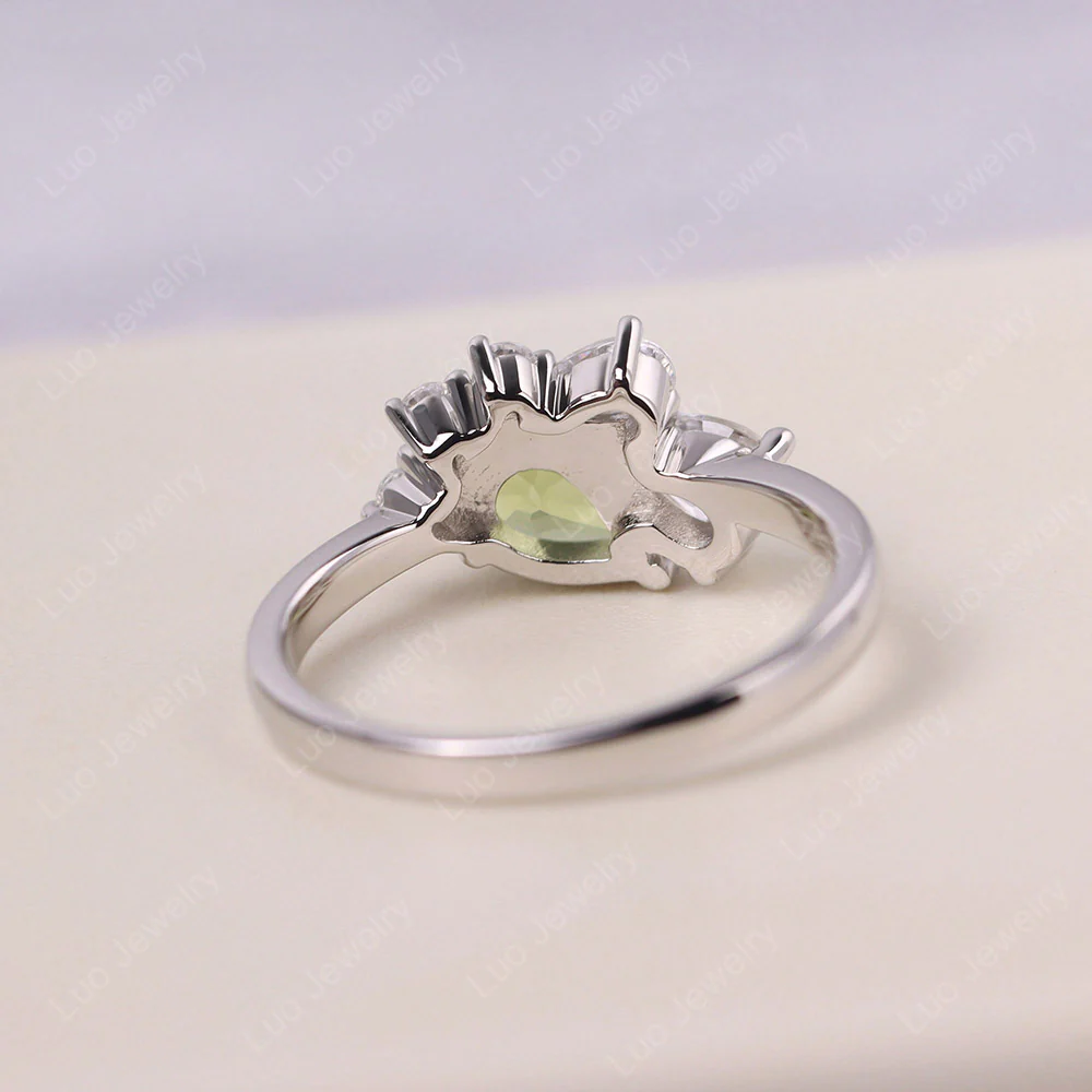 Pear Shaped Cluster Peridot Mothers Ring - Image 3