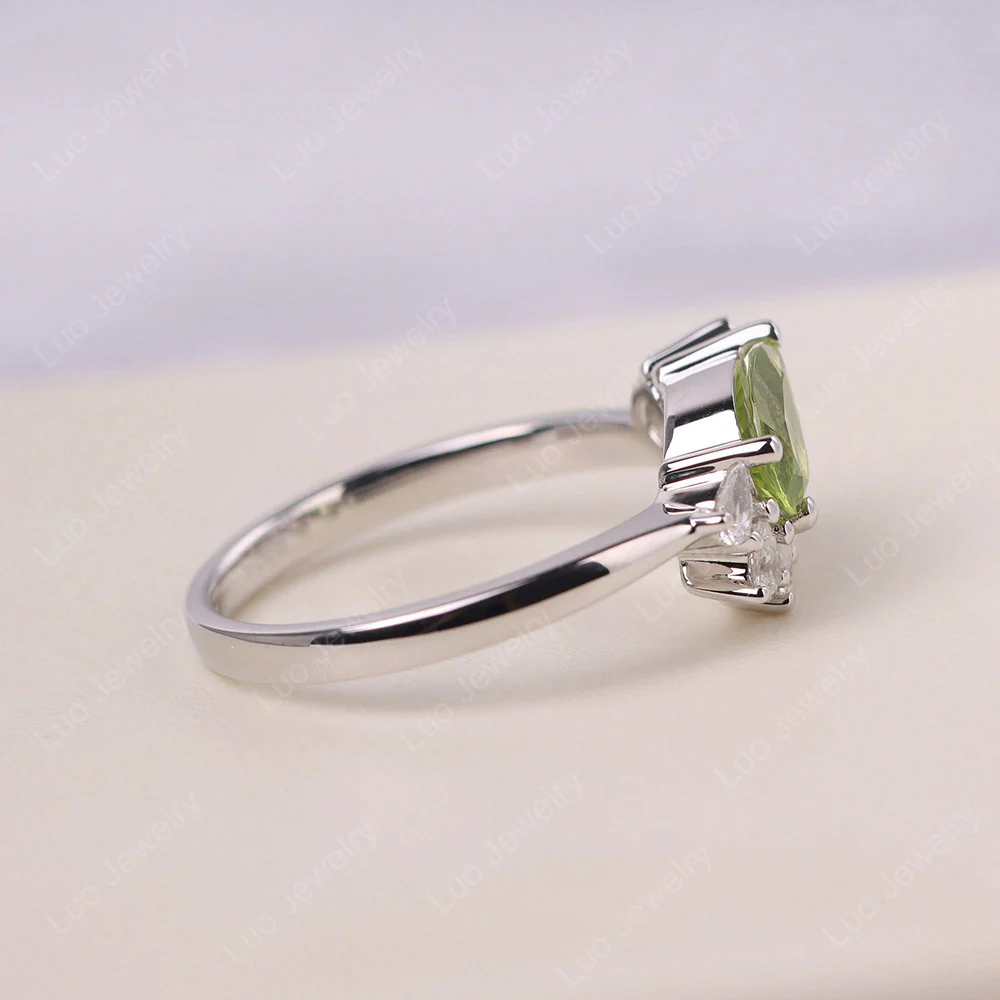 Pear Shaped Cluster Peridot Mothers Ring - Image 4